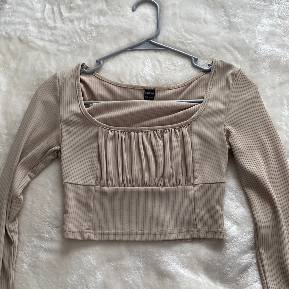 tan cropped top